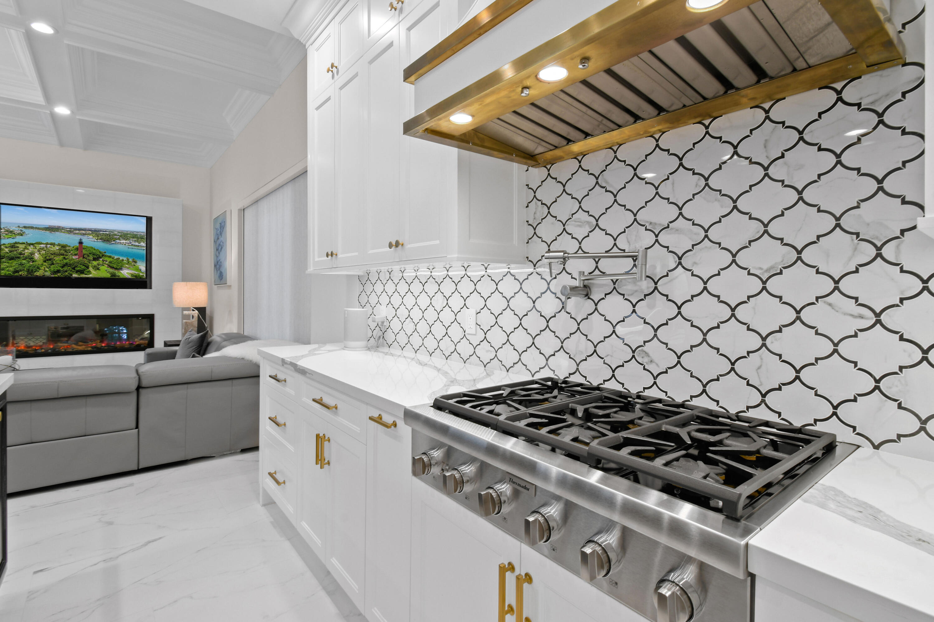 123 Barcelona Drive Jupiter, FL 33458 - Photo 13 of 59 a white stove top oven sitting inside of a kitchen