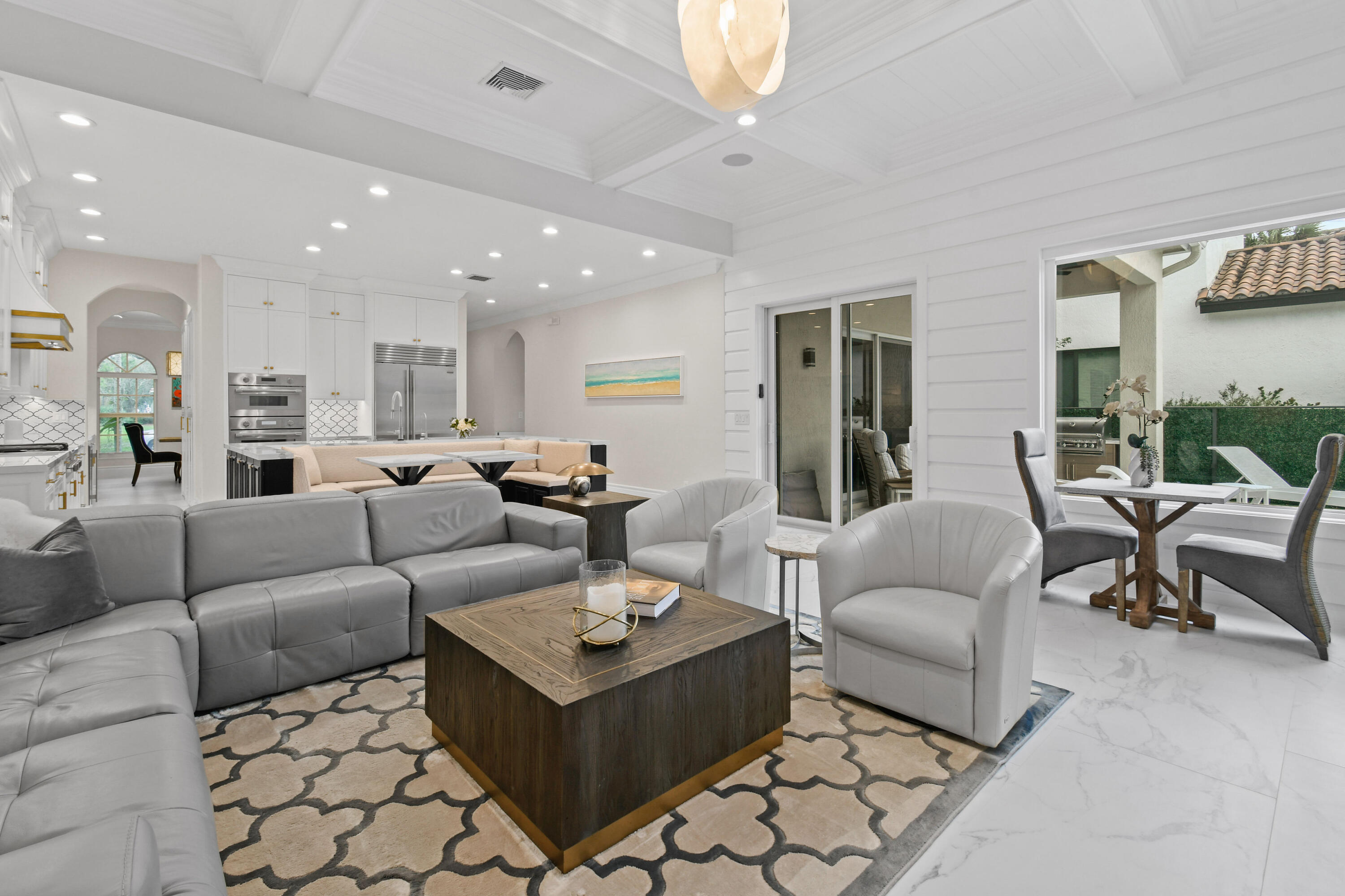 123 Barcelona Drive Jupiter, FL 33458 - Photo 15 of 59 a living room with furniture and a large window