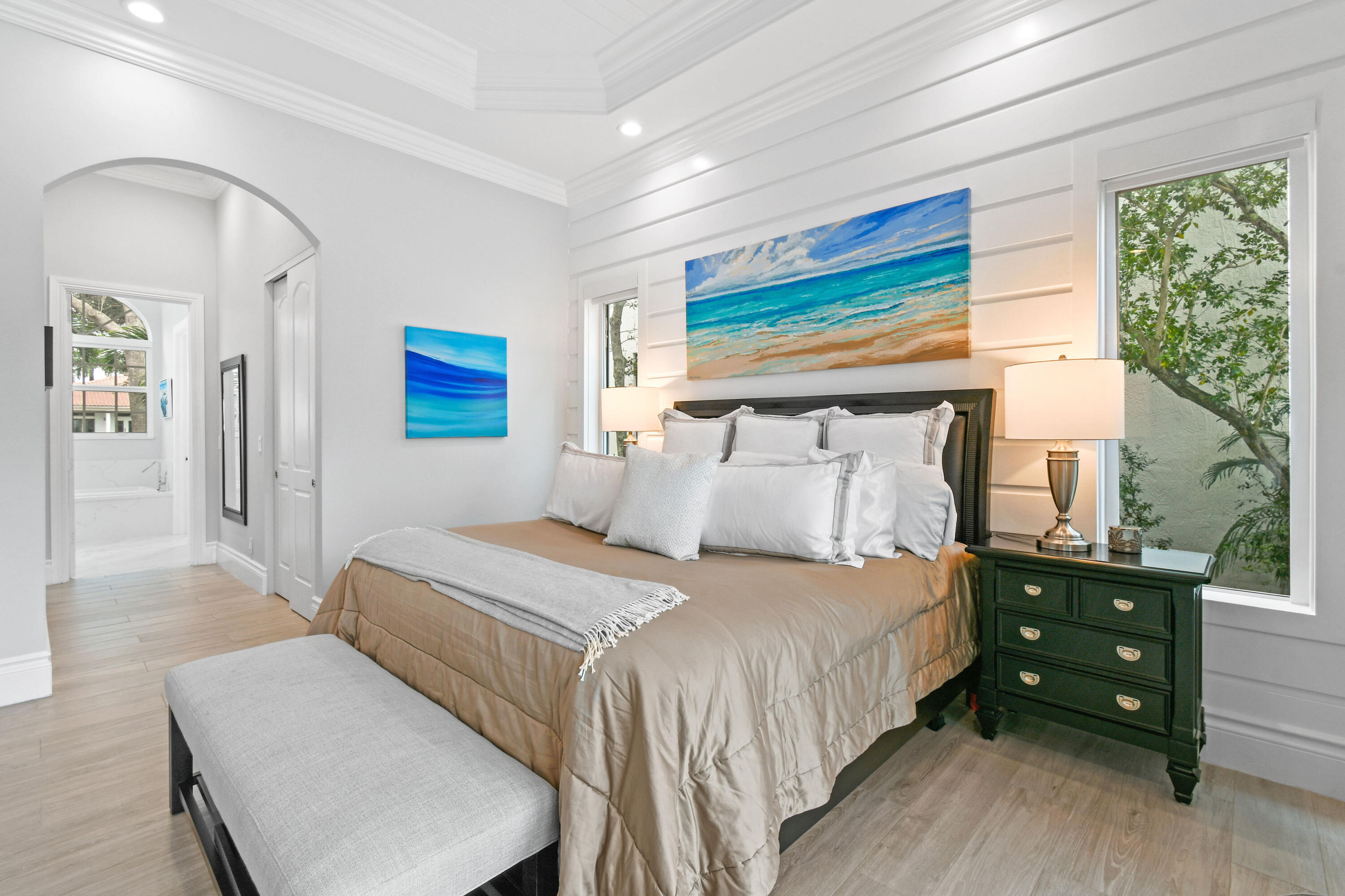 123 Barcelona Drive Jupiter, FL 33458 - Photo 18 of 59 a bedroom with a bed and a dresser