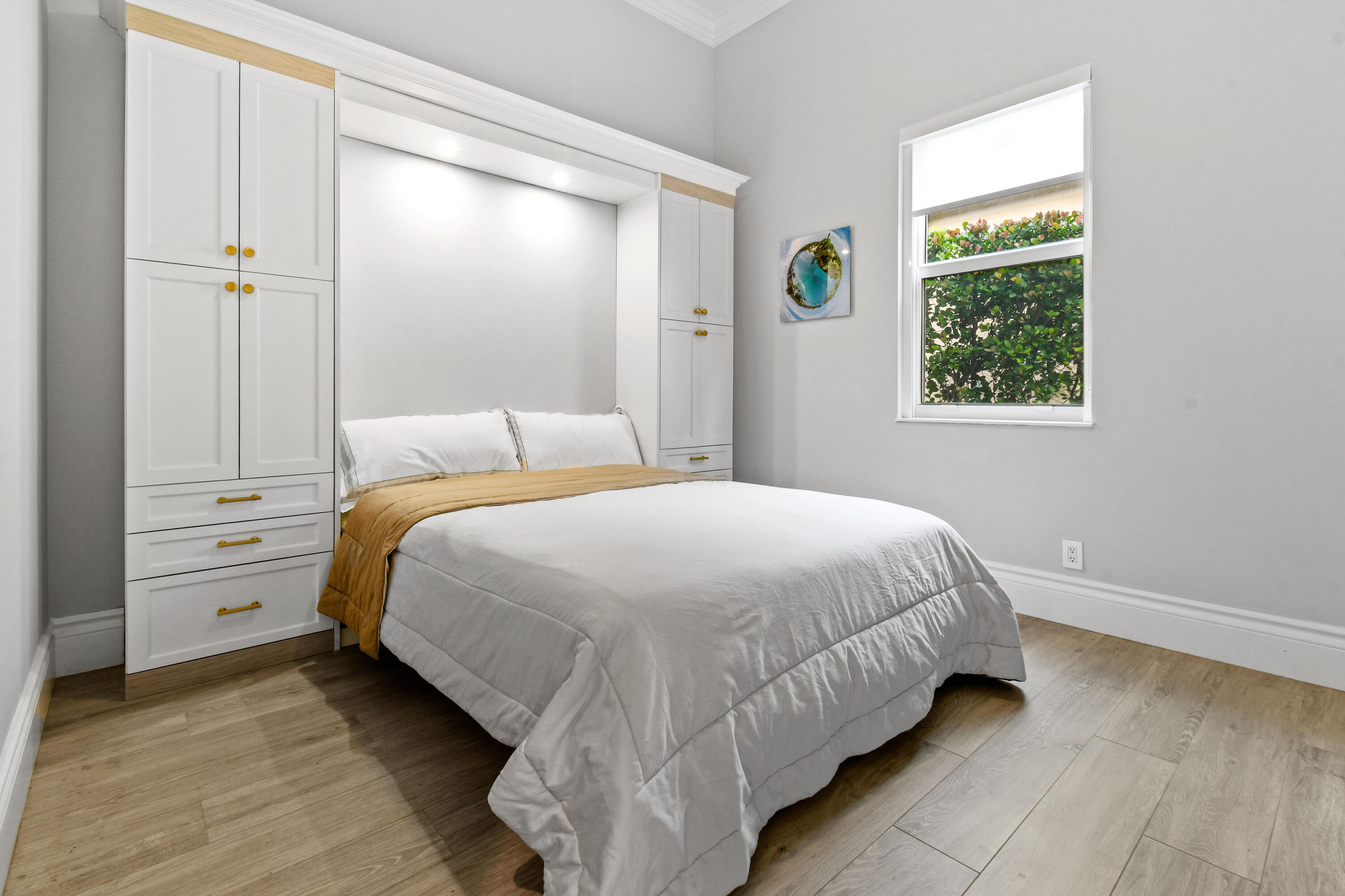 123 Barcelona Drive Jupiter, FL 33458 - Photo 25 of 59 a bedroom with a bed and a window