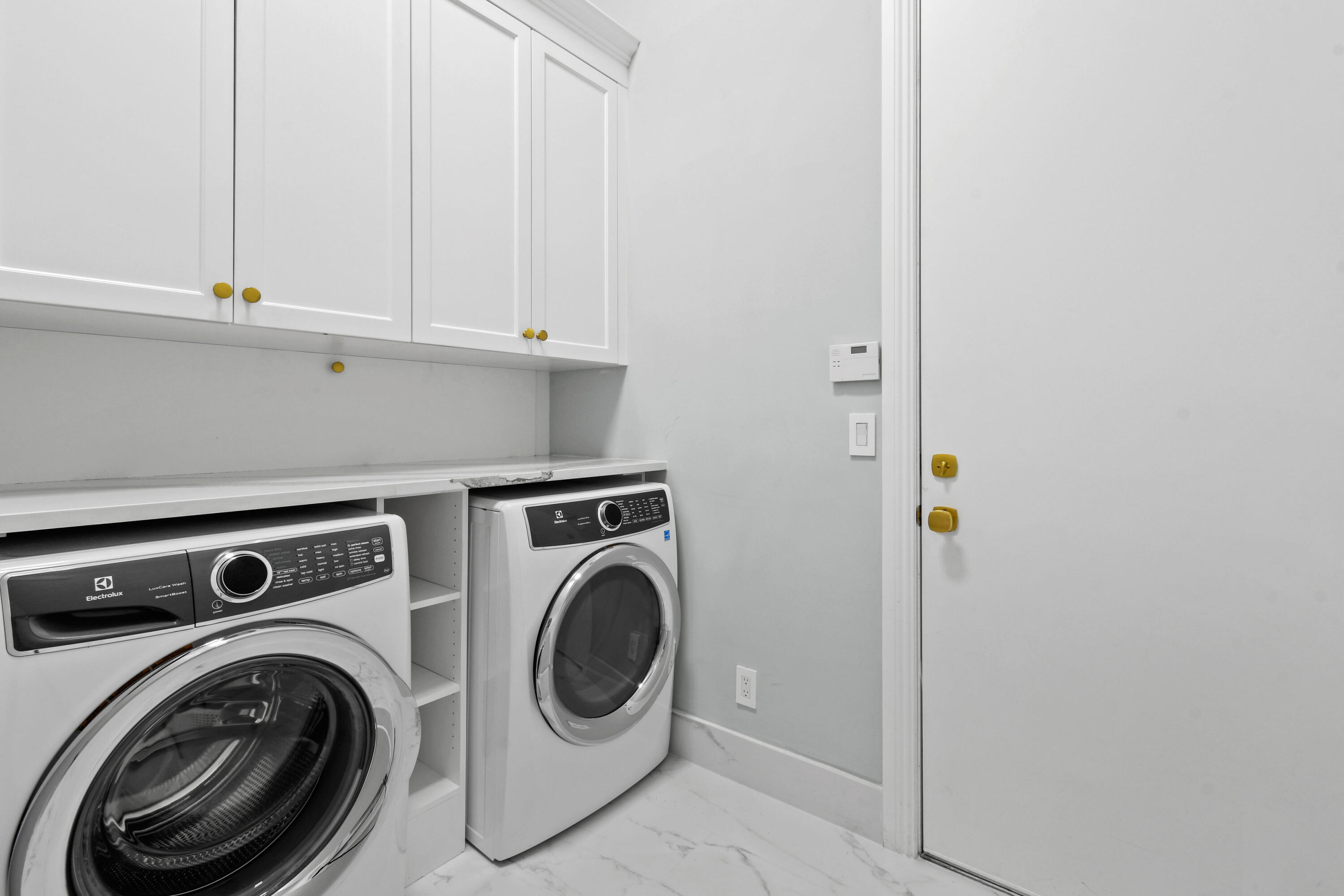 123 Barcelona Drive Jupiter, FL 33458 - Photo 28 of 59 a utility room with dryer and washer