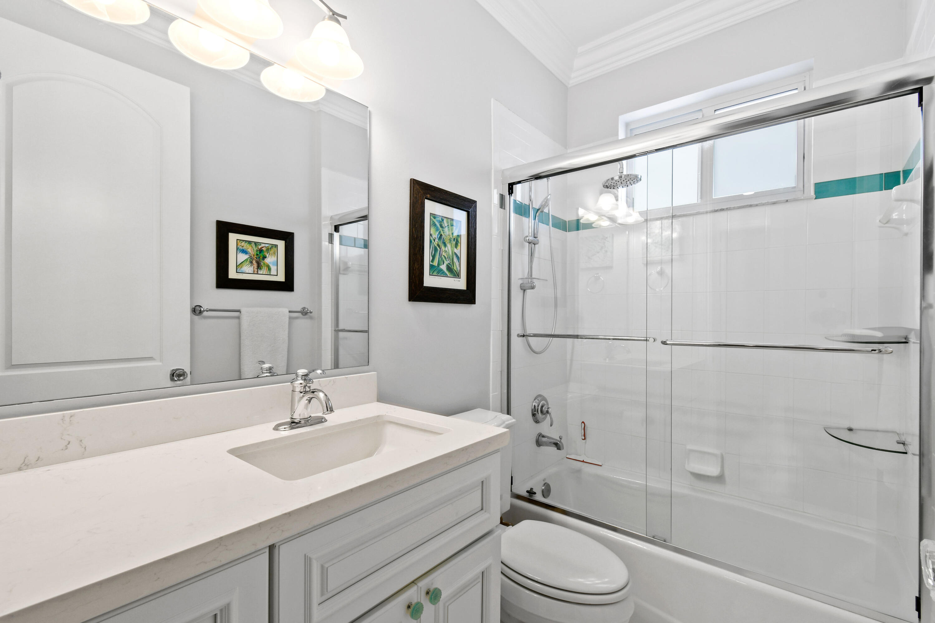 123 Barcelona Drive Jupiter, FL 33458 - Photo 31 of 59 a bathroom with a sink toilet and shower