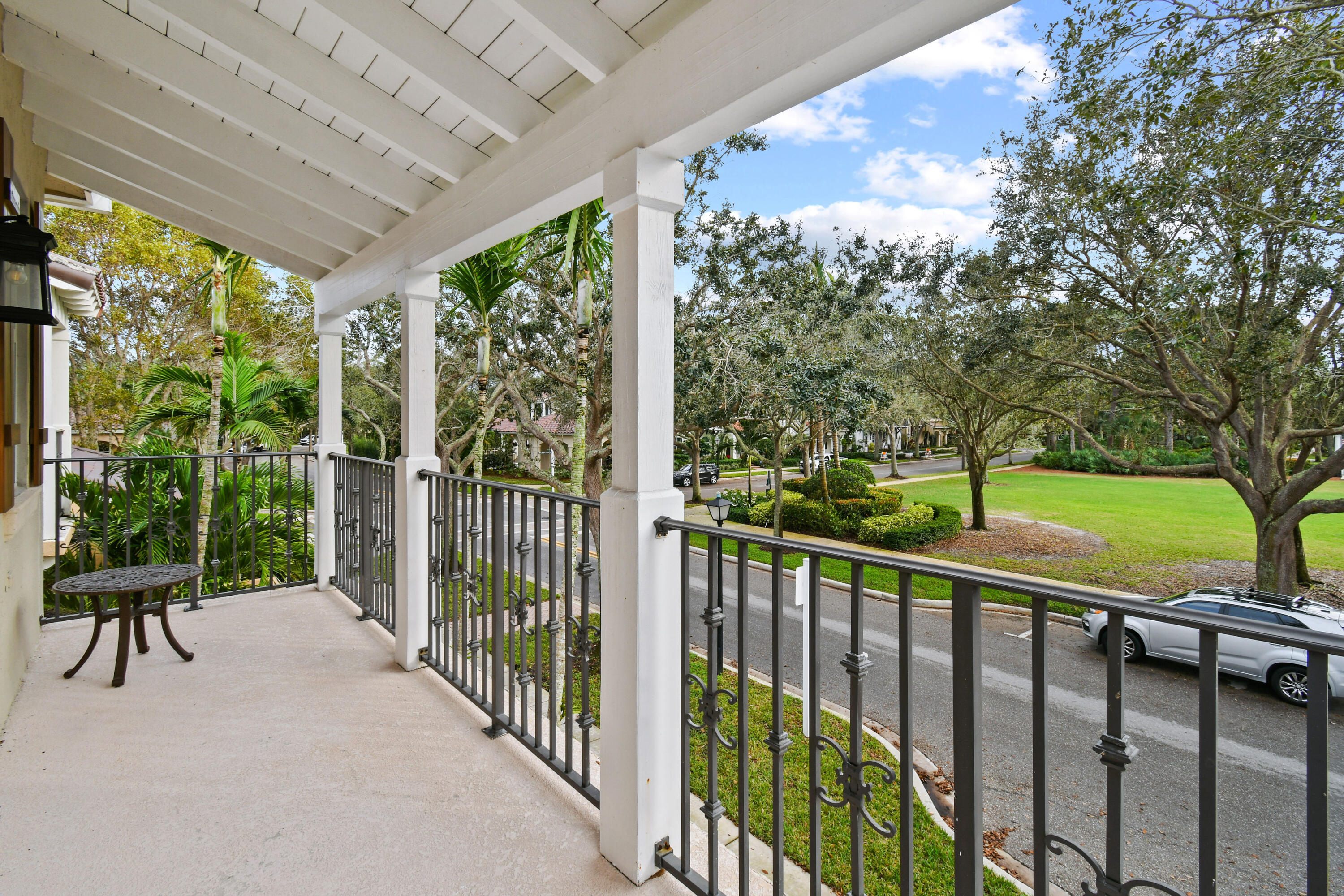 123 Barcelona Drive Jupiter, FL 33458 - Photo 35 of 59 a view of a porch and garden