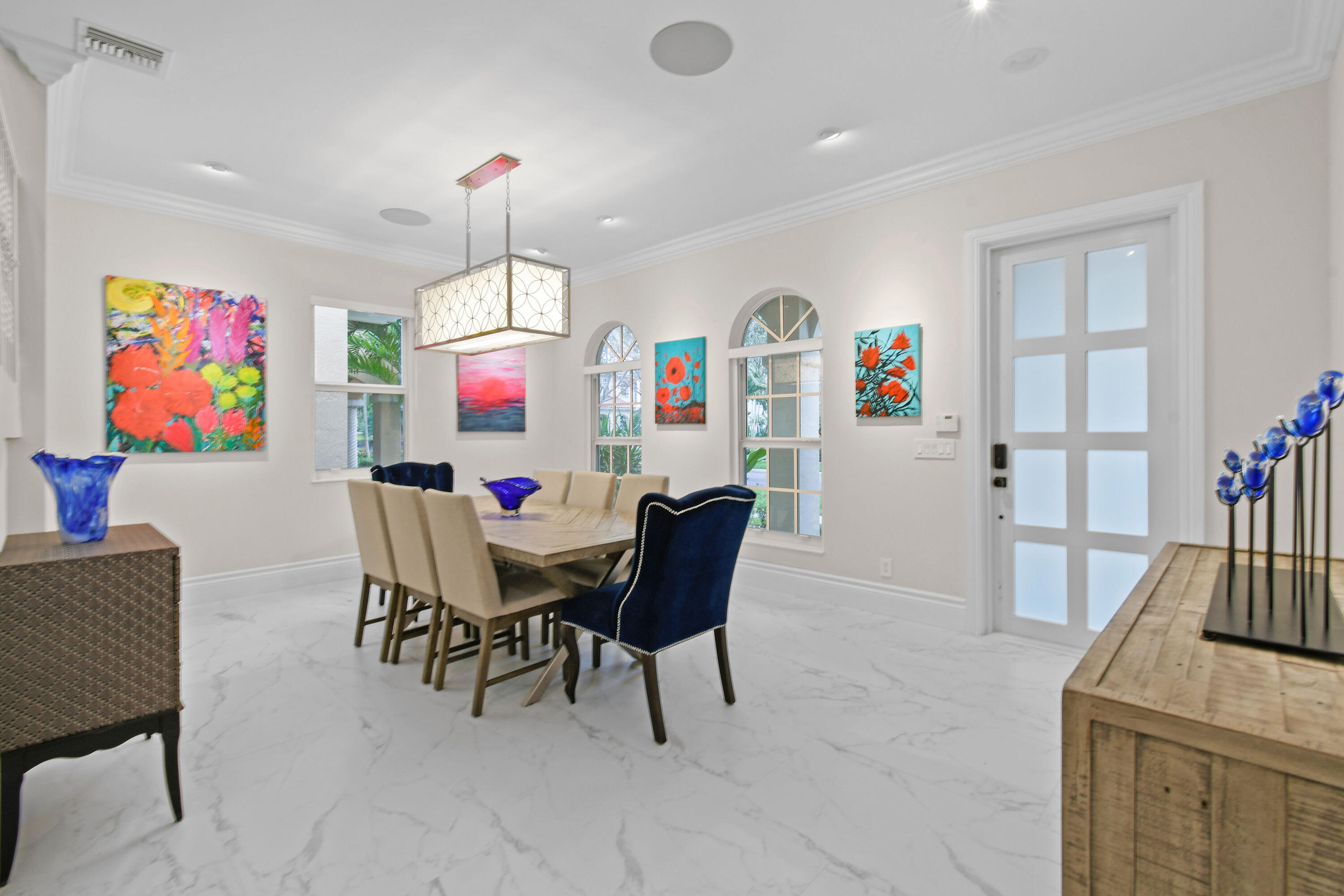 123 Barcelona Drive Jupiter, FL 33458 - Photo 4 of 59 a dining room with furniture and window