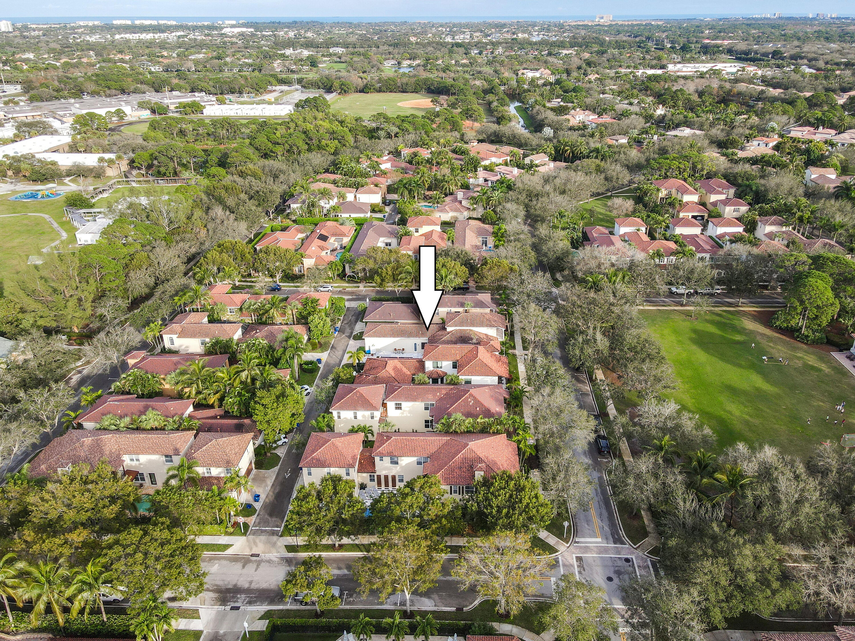 123 Barcelona Drive Jupiter, FL 33458 - Photo 48 of 59 an aerial view of residential houses with outdoor space