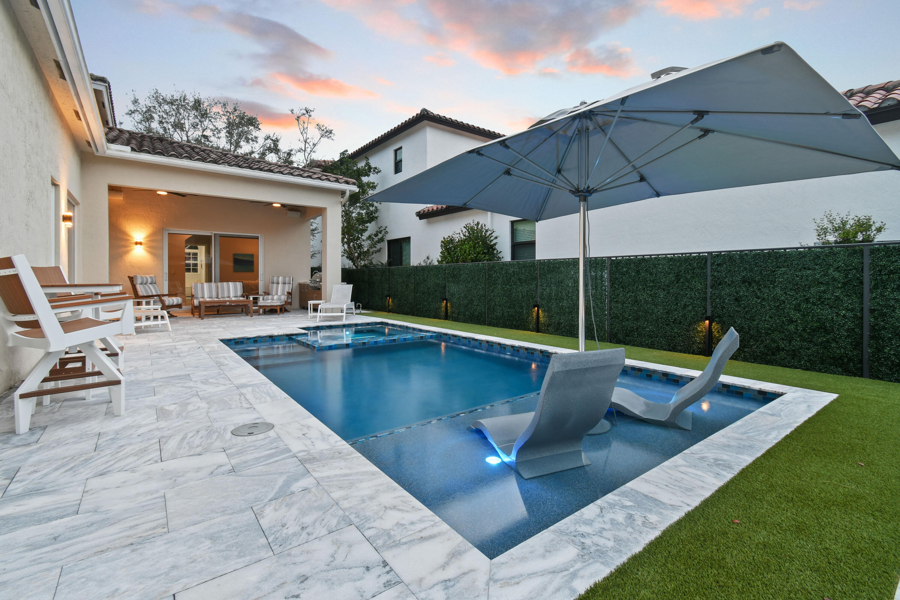 123 Barcelona Drive Jupiter, FL 33458 - Photo 49 of 59 swimming pool view with a seating space