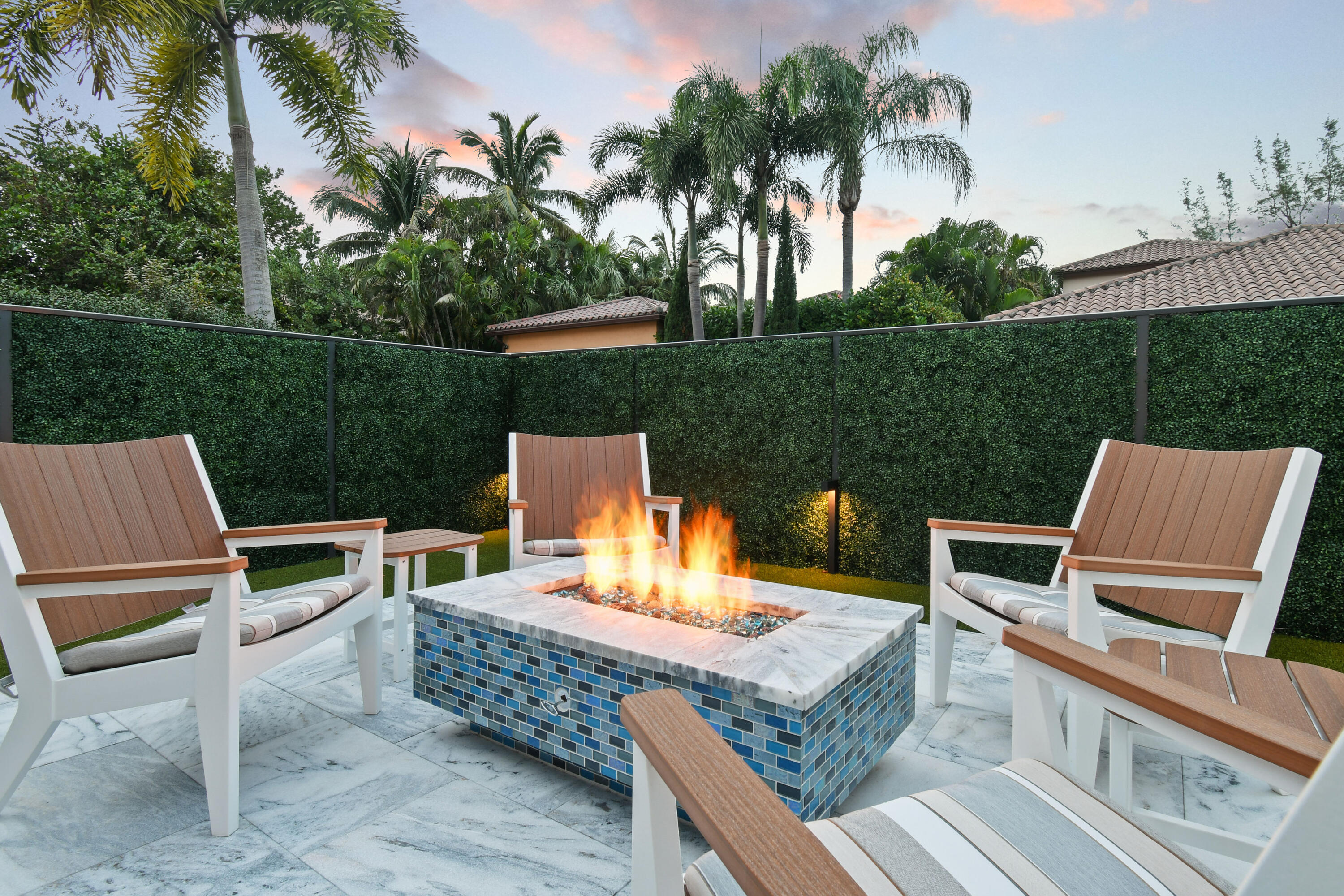 123 Barcelona Drive Jupiter, FL 33458 - Photo 53 of 59 a view of a chairs and table in the patio