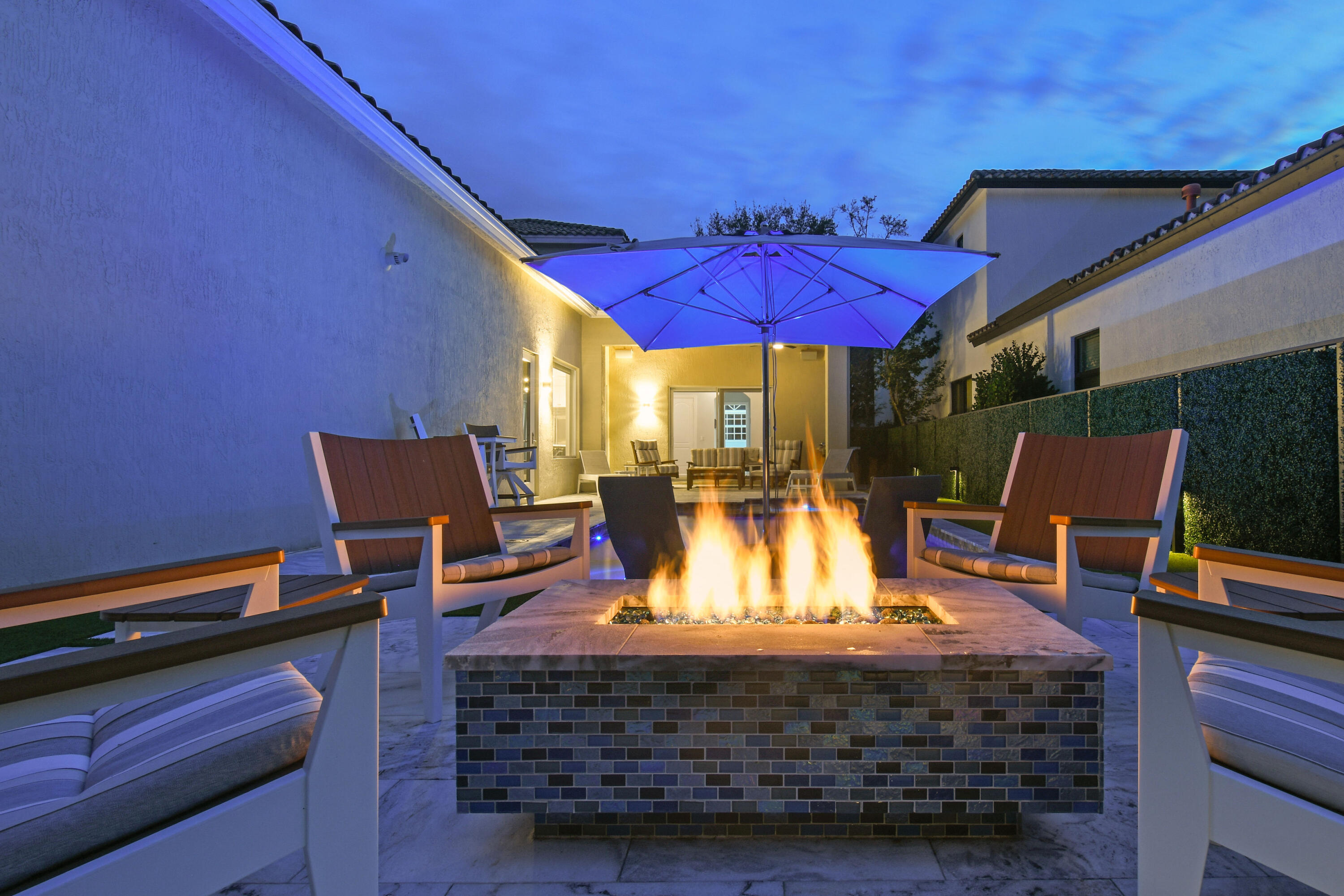 123 Barcelona Drive Jupiter, FL 33458 - Photo 57 of 59 a view of dinning table and chairs in the patio