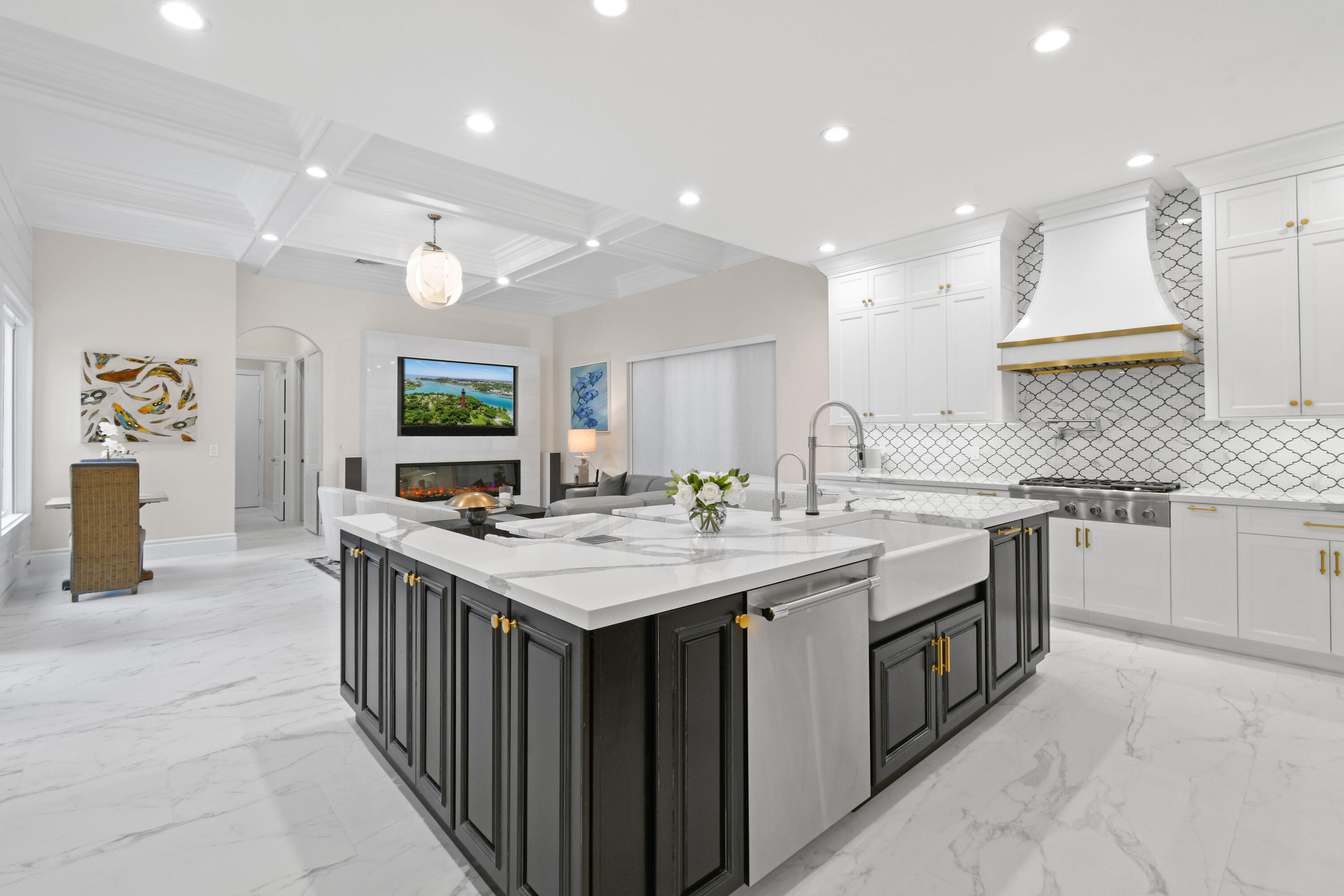 123 Barcelona Drive Jupiter, FL 33458 - Photo 6 of 59 a kitchen with sink stove and cabinets