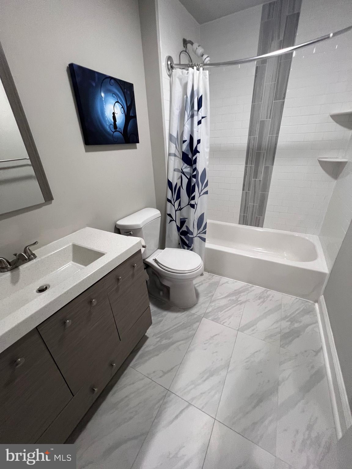1206 Sycamore Avenue Croydon, PA 19021 - Photo 22 of 24 a bathroom with a sink a toilet and shower
