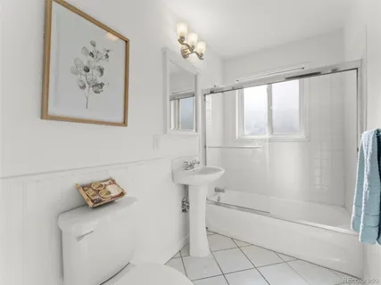 a bathroom with a shower and a bathtub