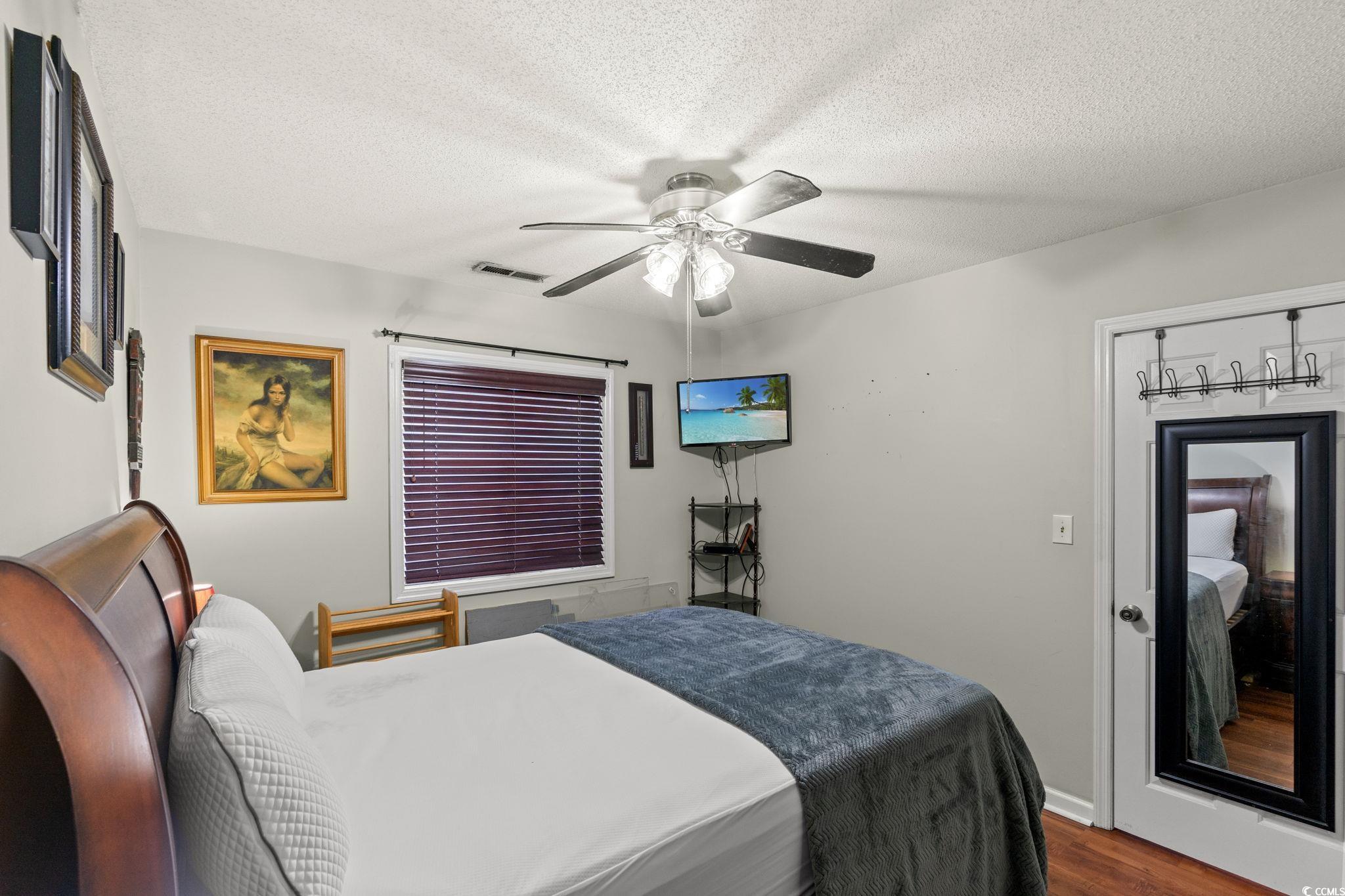 216 Landing Road, Unit H216 North Myrtle Beach, SC 29582 - Photo 14 of 23 Living room with light wood-style floors, ceiling fan, and lofted ceiling