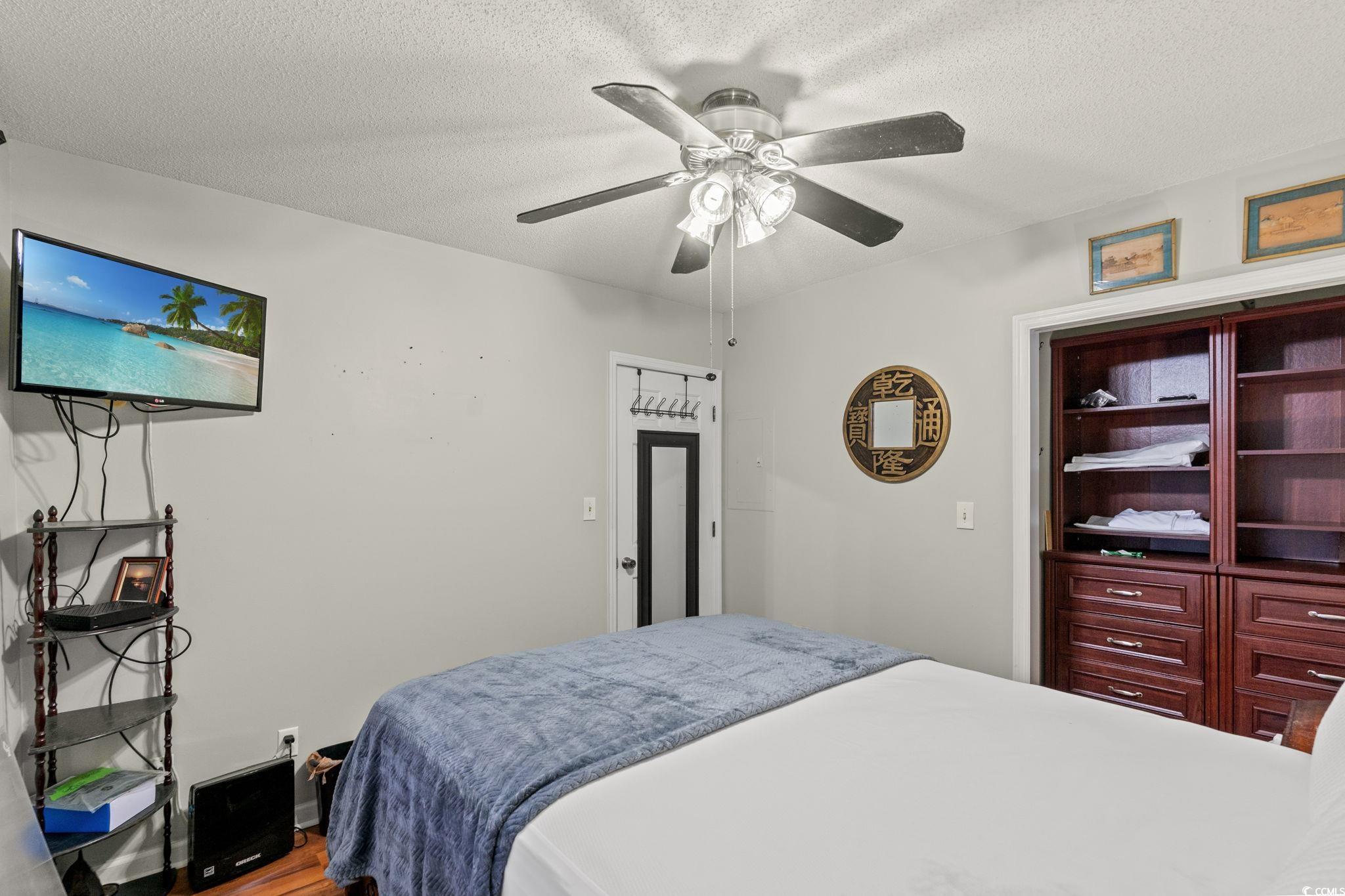 216 Landing Road, Unit H216 North Myrtle Beach, SC 29582 - Photo 15 of 23 Living room featuring light wood-style flooring and ceiling fan