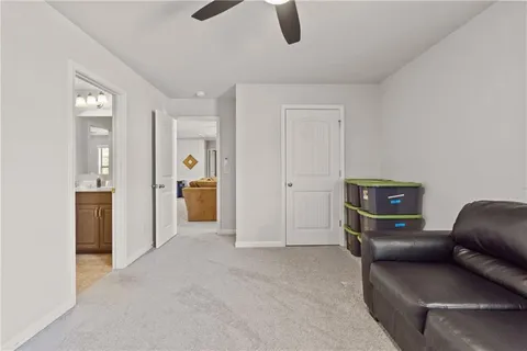 a view of a room with wooden walls