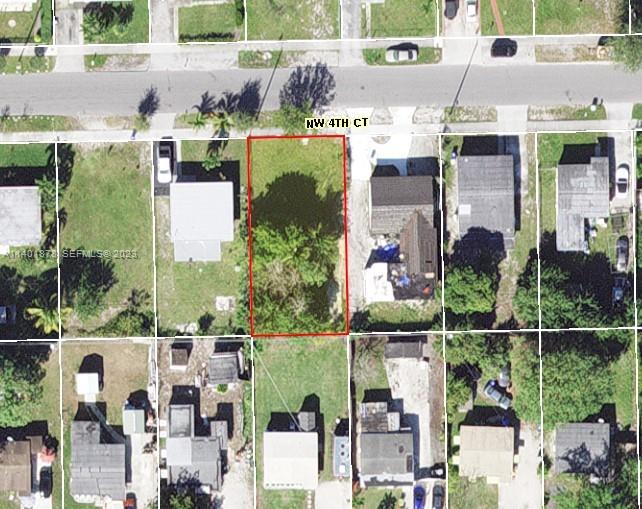 4 Nw Court Pompano Beach, FL 33069 - Photo 6 of 9 a aerial view of multiple house