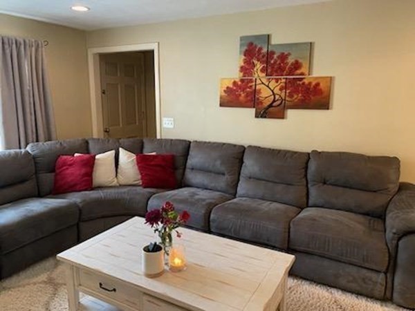 33 Kittrell Street Springfield, MA 01119 - Photo 9 of 23 a living room with furniture and wooden floor