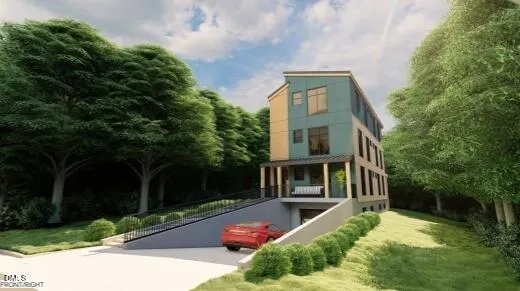 a front view of a house with yard