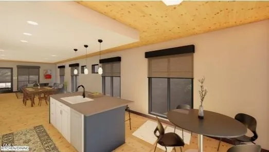 a kitchen with a table and chairs