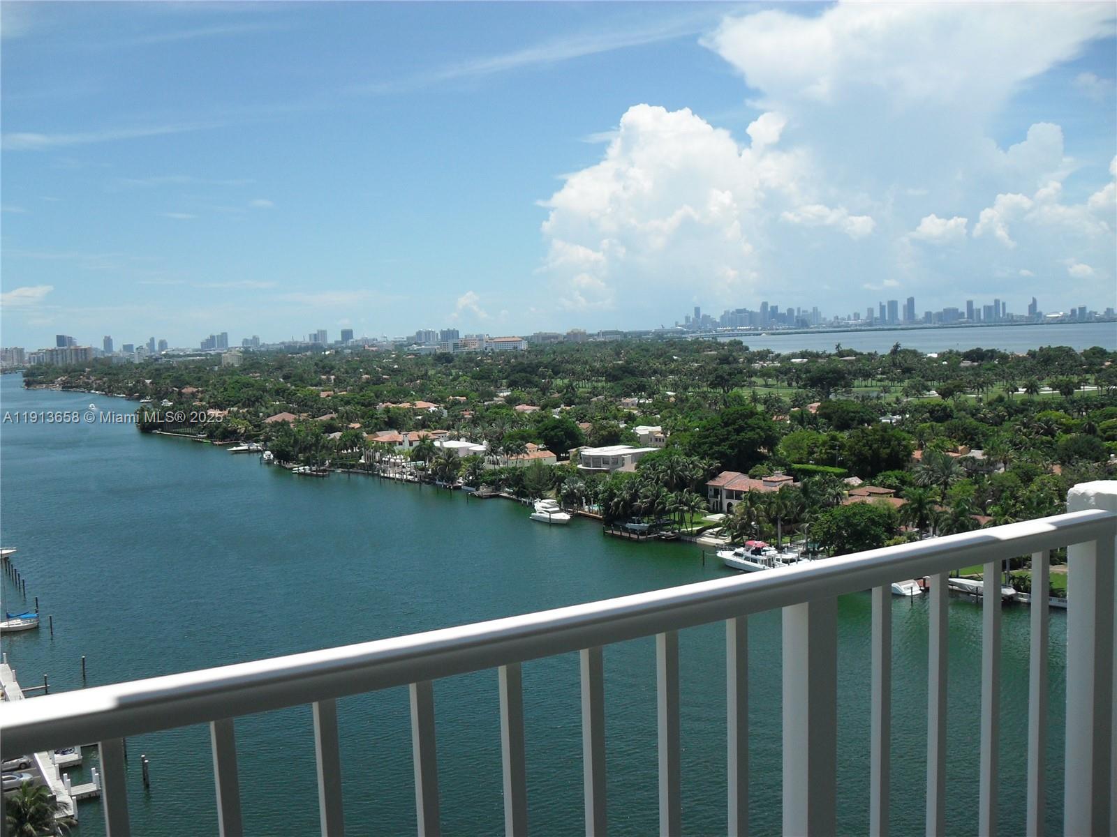 5838 Collins Avenue, Unit PHF Miami Beach, FL 33140 - Photo 1 of 16 a view of city and a lake