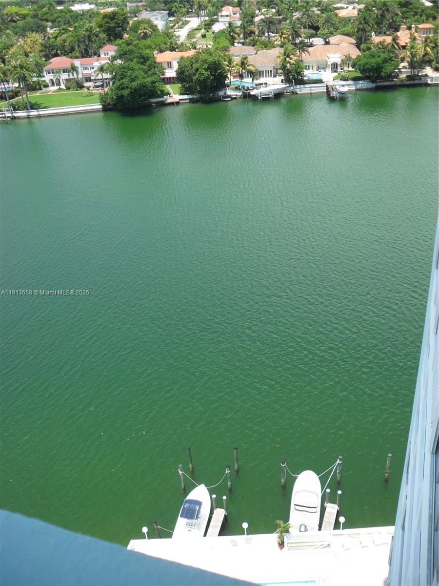 5838 Collins Avenue, Unit PHF Miami Beach, FL 33140 - Photo 12 of 16 a view of a lake with a city