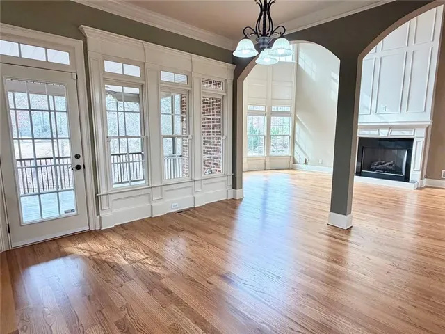 a view of room with a ceiling fan and window