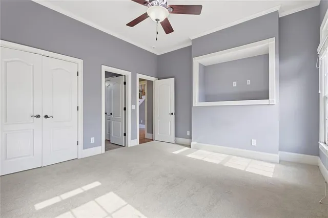 an aerial view of a house with a swimming pool