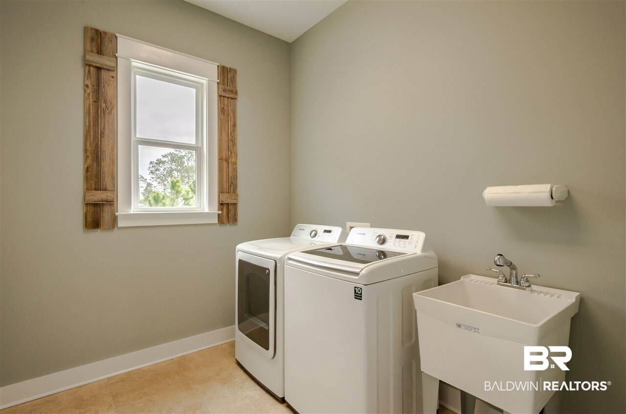 10947 County Road 1 Fairhope, AL 36532 - Photo 13 of 39 Main floor utility with sink
