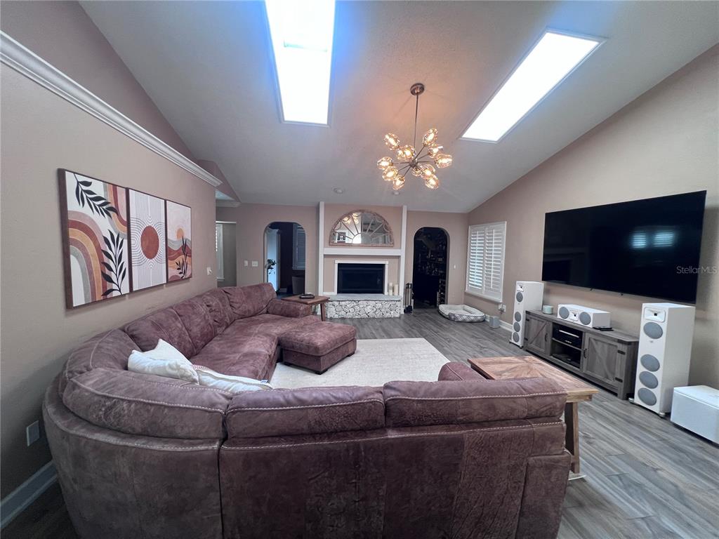 357 Tymber Run Ormond Beach, FL 32174 - Photo 9 of 32 a living room with furniture and a flat screen tv