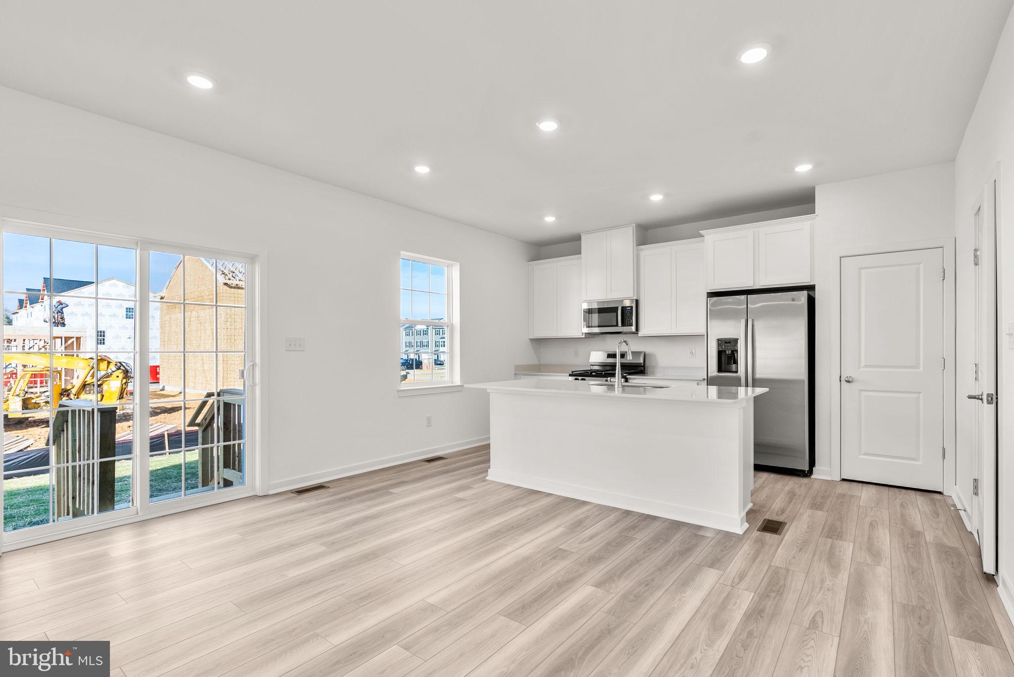 1 Inkwell Lane Sicklerville, NJ 08081 - Photo 12 of 32 a kitchen with a refrigerator and a window