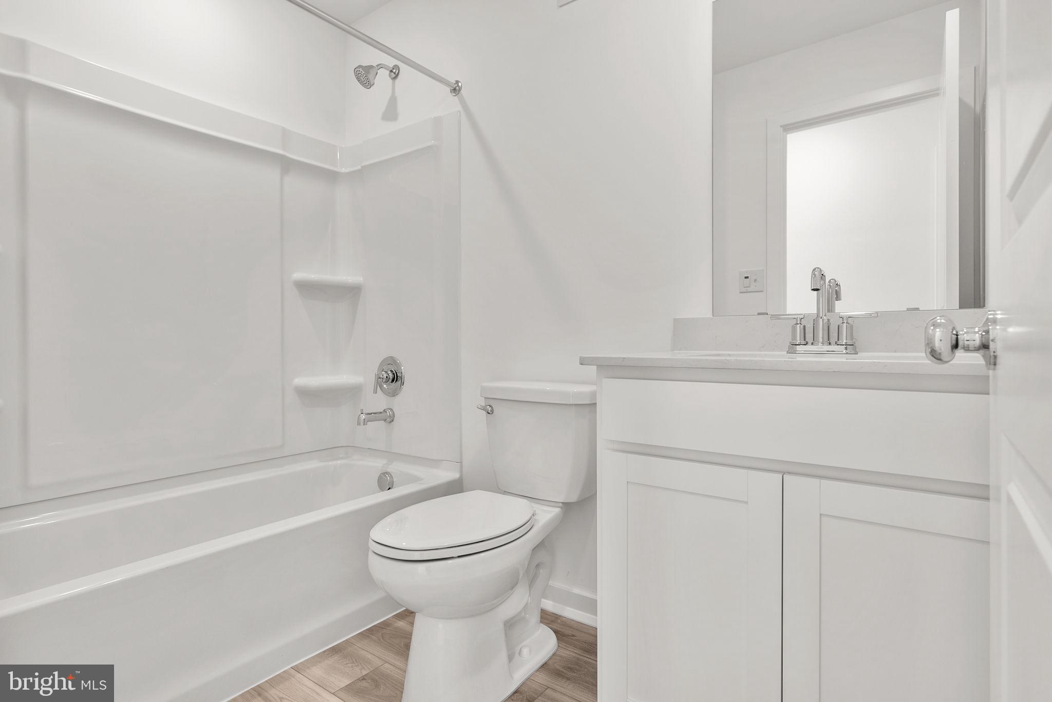 1 Inkwell Lane Sicklerville, NJ 08081 - Photo 19 of 32 a bathroom with a sink toilet vanity and shower