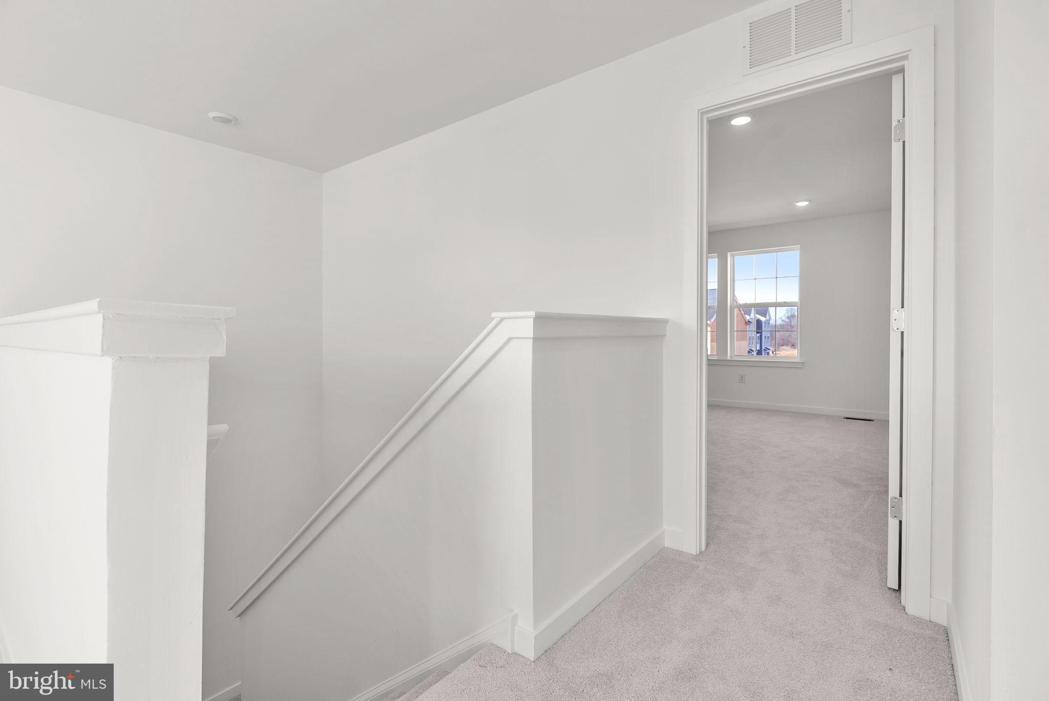 1 Inkwell Lane Sicklerville, NJ 08081 - Photo 25 of 32 a view of a hallway with wooden floor