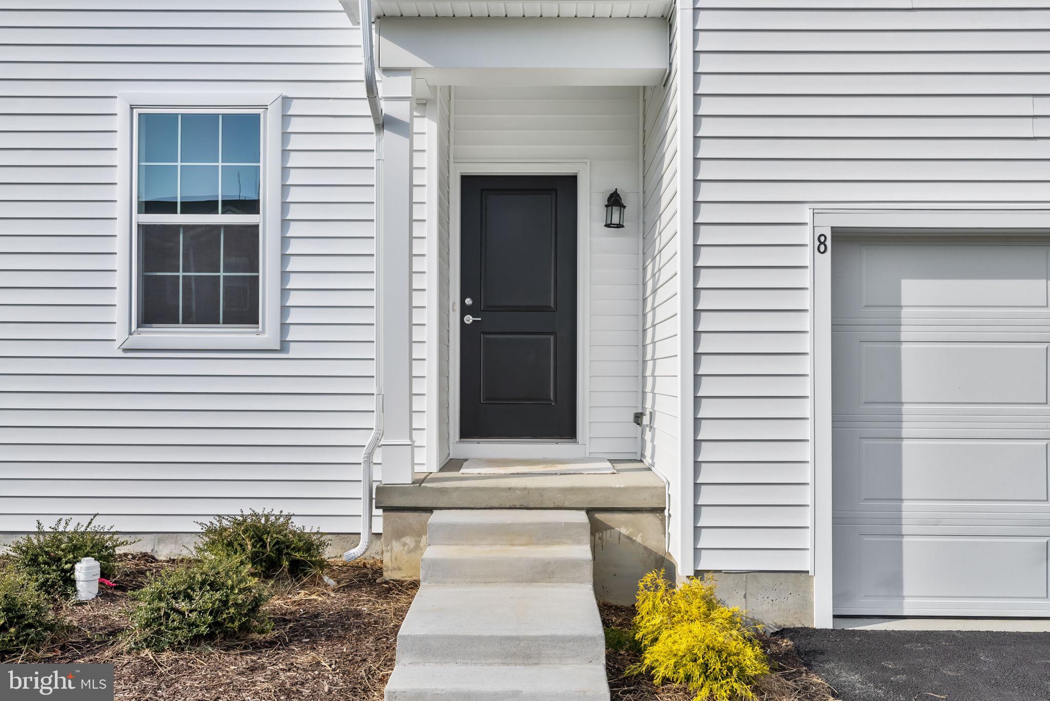 1 Inkwell Lane Sicklerville, NJ 08081 - Photo 3 of 32 a front view of a house with a garden