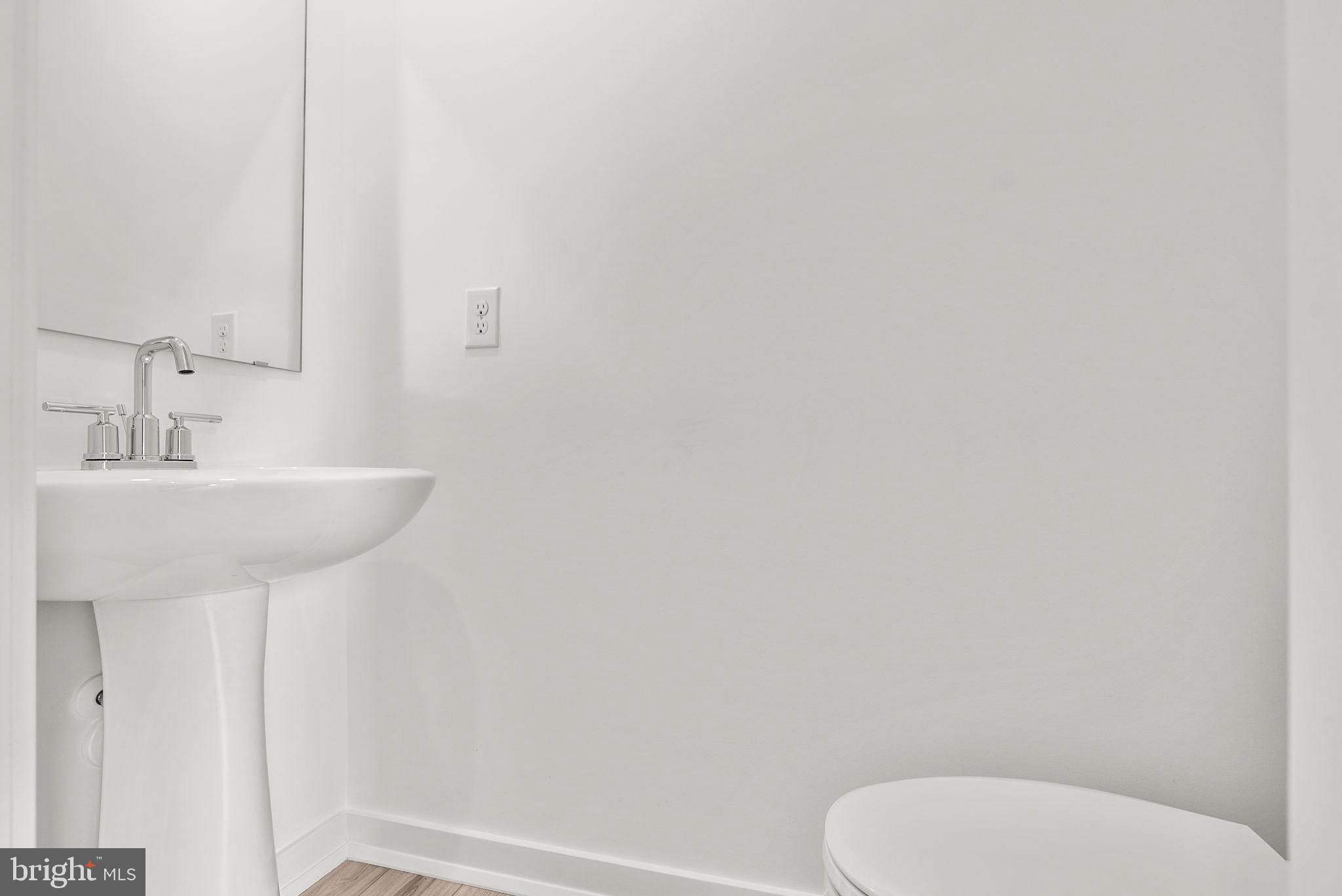 1 Inkwell Lane Sicklerville, NJ 08081 - Photo 8 of 32 a bathroom with a toilet sink and mirror