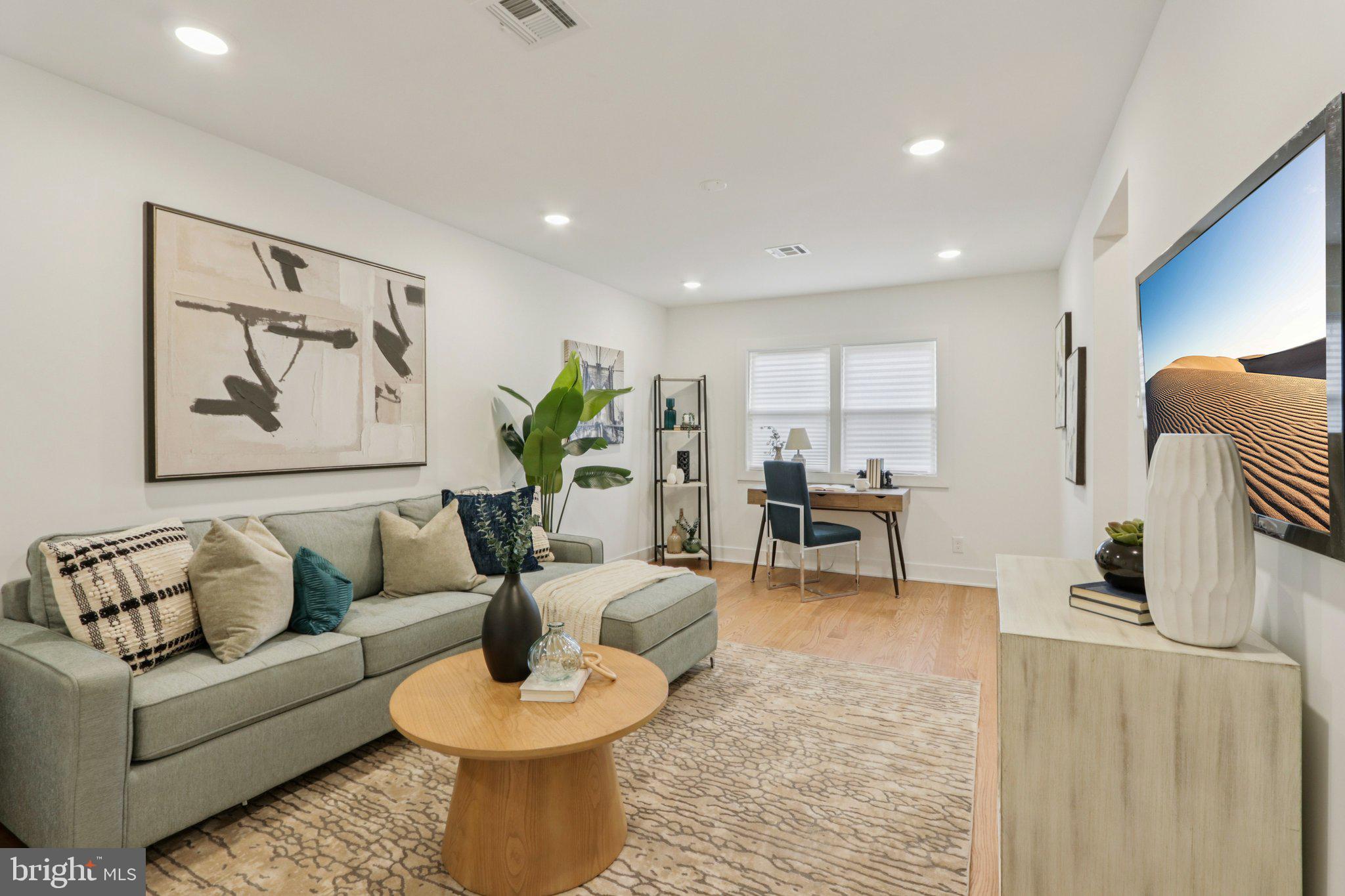 3004 North Wales Road Norristown, PA 19403 - Photo 24 of 44 a living room with furniture and a wooden floor