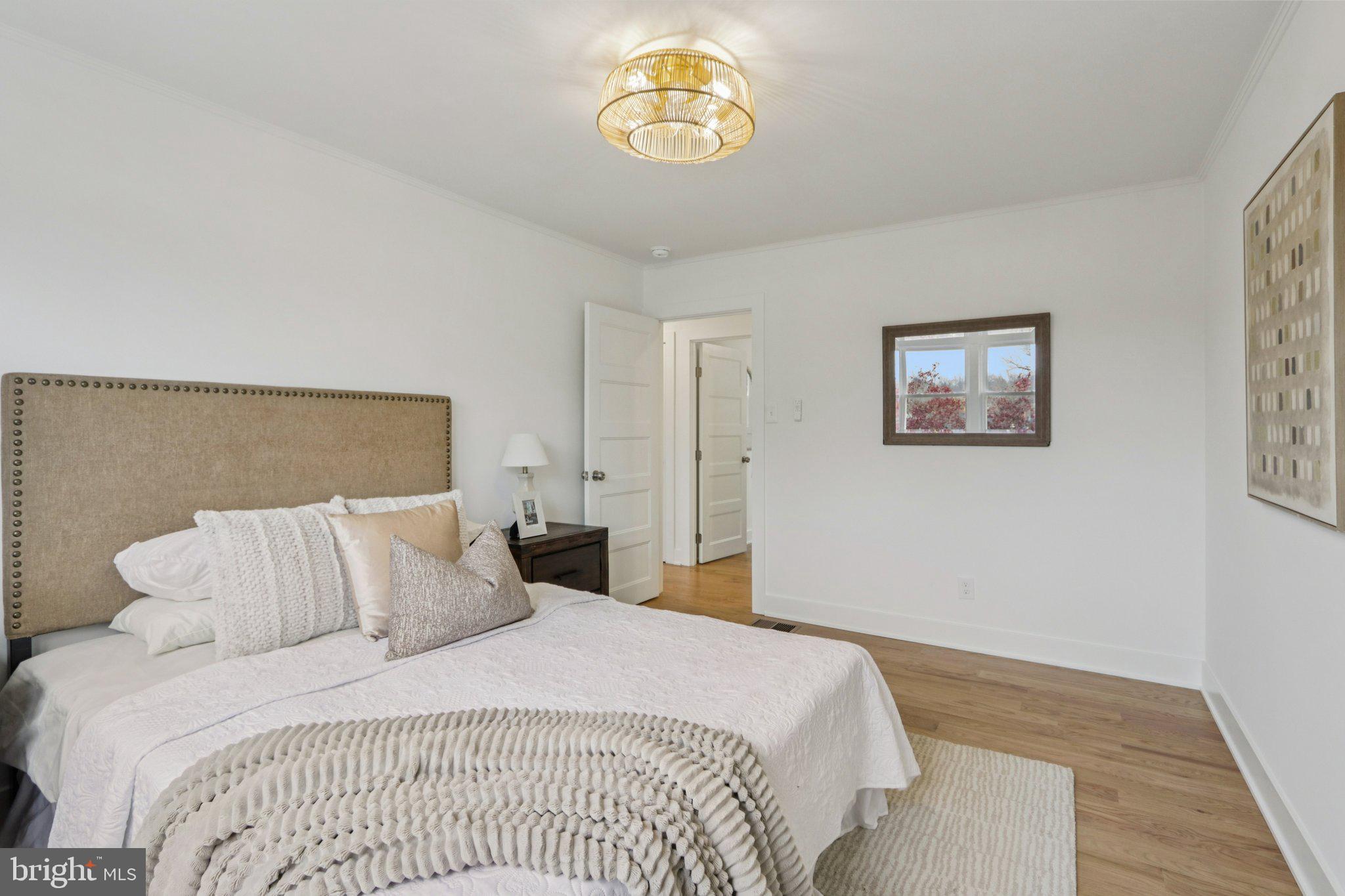 3004 North Wales Road Norristown, PA 19403 - Photo 33 of 44 a bedroom with a bed and a window
