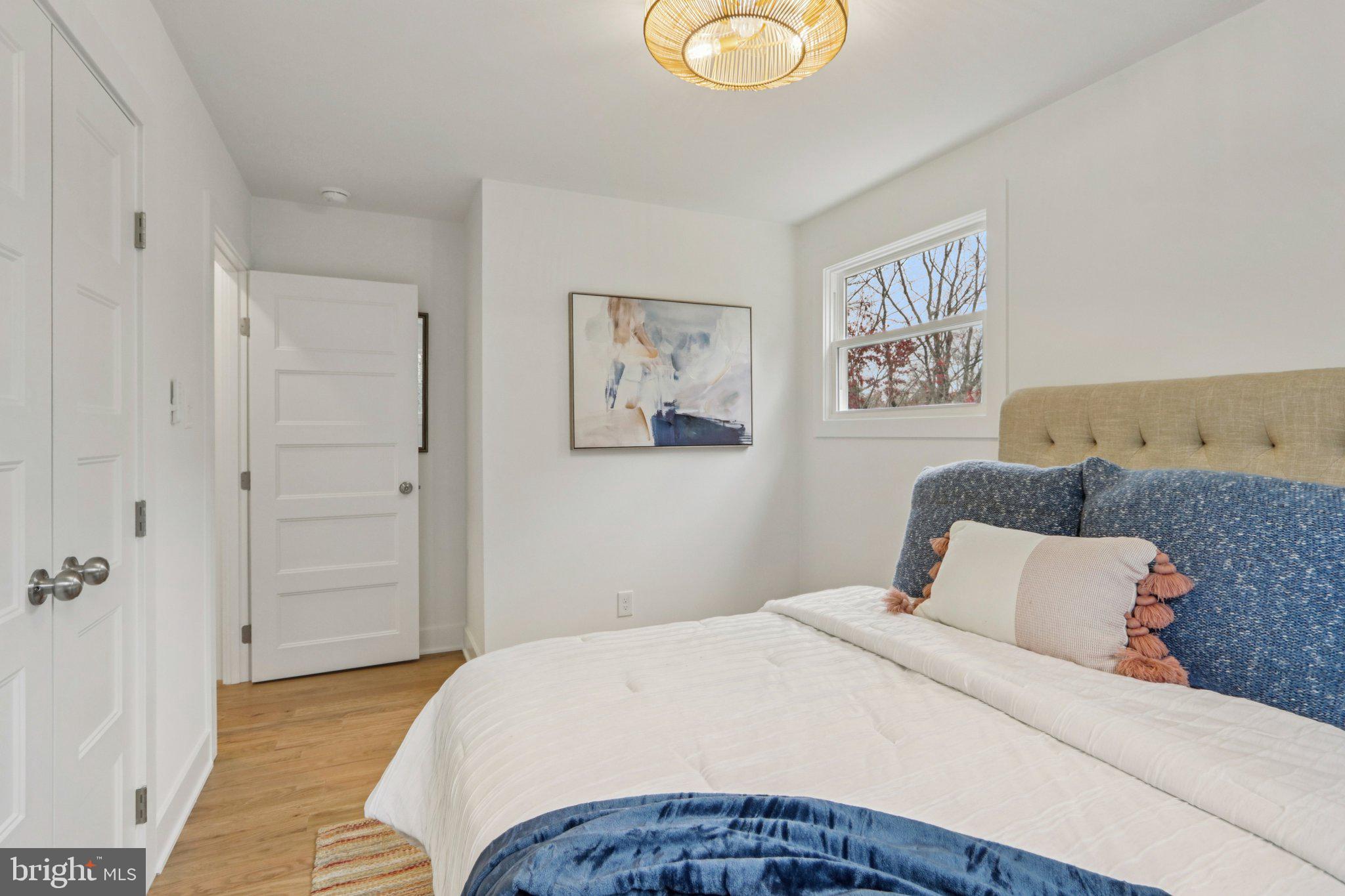 3004 North Wales Road Norristown, PA 19403 - Photo 36 of 44 a bedroom with a large bed and a window