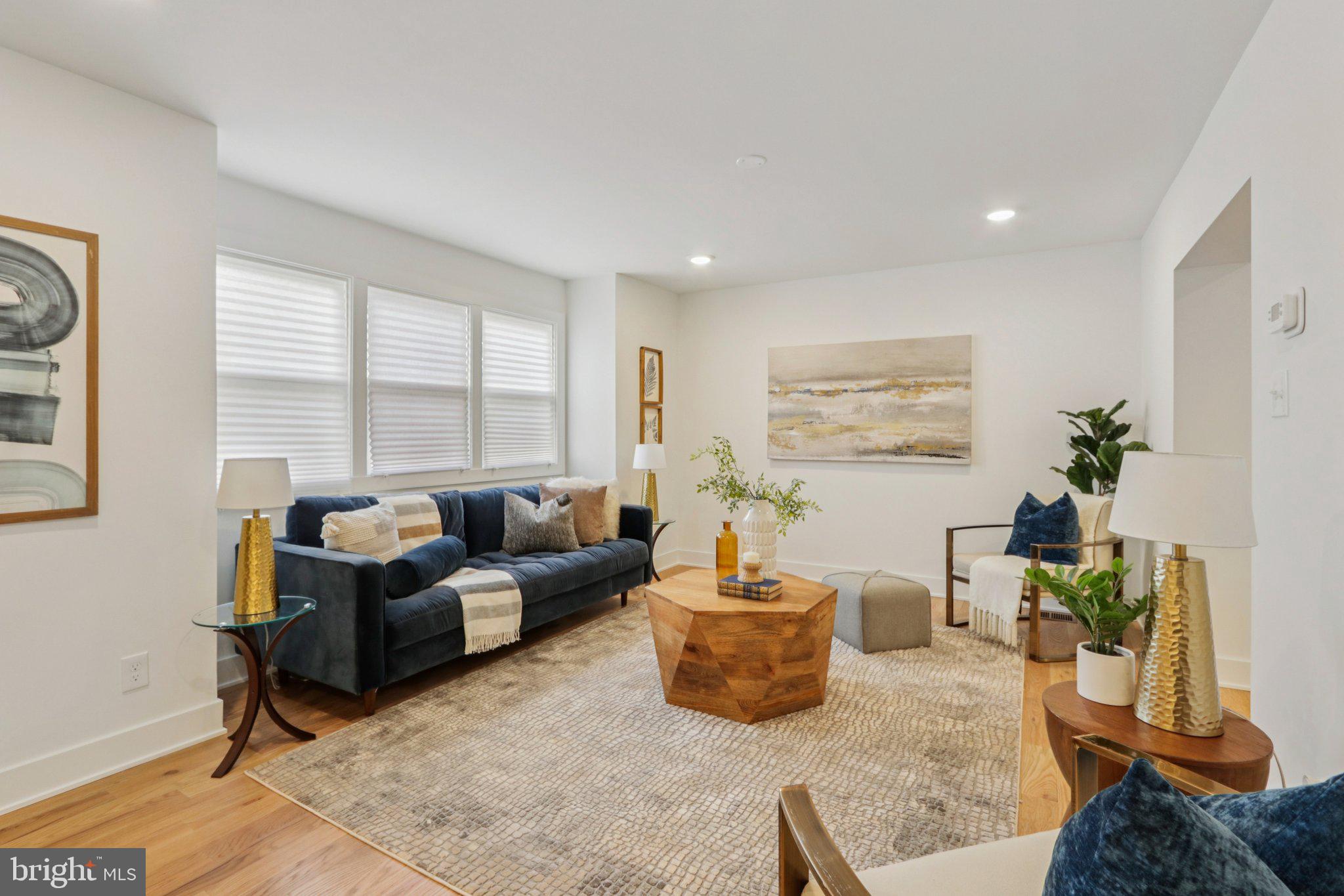 3004 North Wales Road Norristown, PA 19403 - Photo 9 of 44 a living room with furniture and a large window