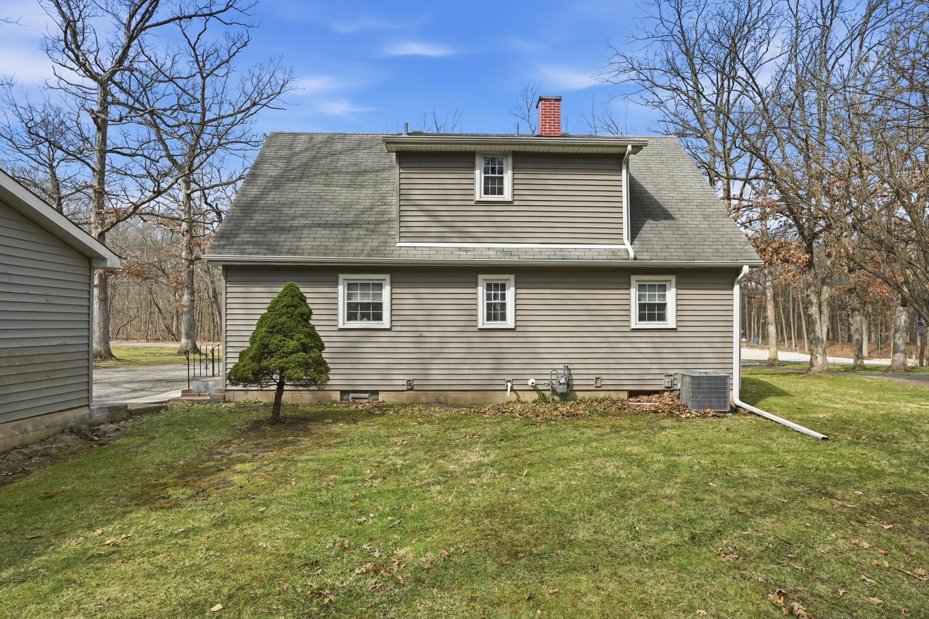 8951 State Line Road Dyer, IN 46311 - Photo 20 of 28 a view of a house with a yard