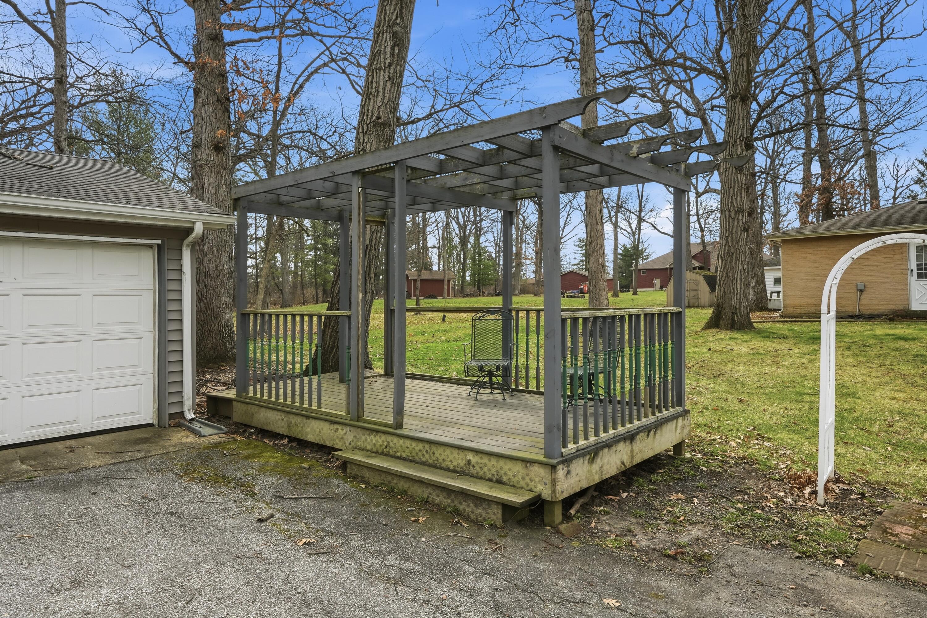 8951 State Line Road Dyer, IN 46311 - Photo 22 of 28 a view of a wrought iron fences in front of house