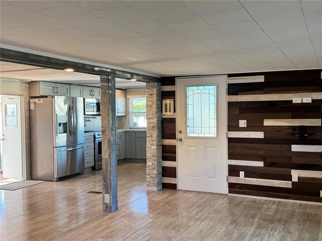 a bathroom with a toilet and shower