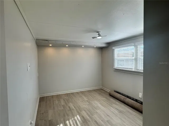 a view of an empty room and window