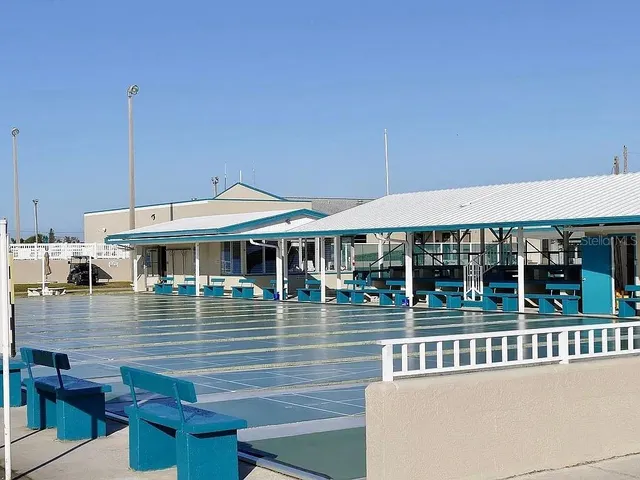 a view of a lake with a big yard