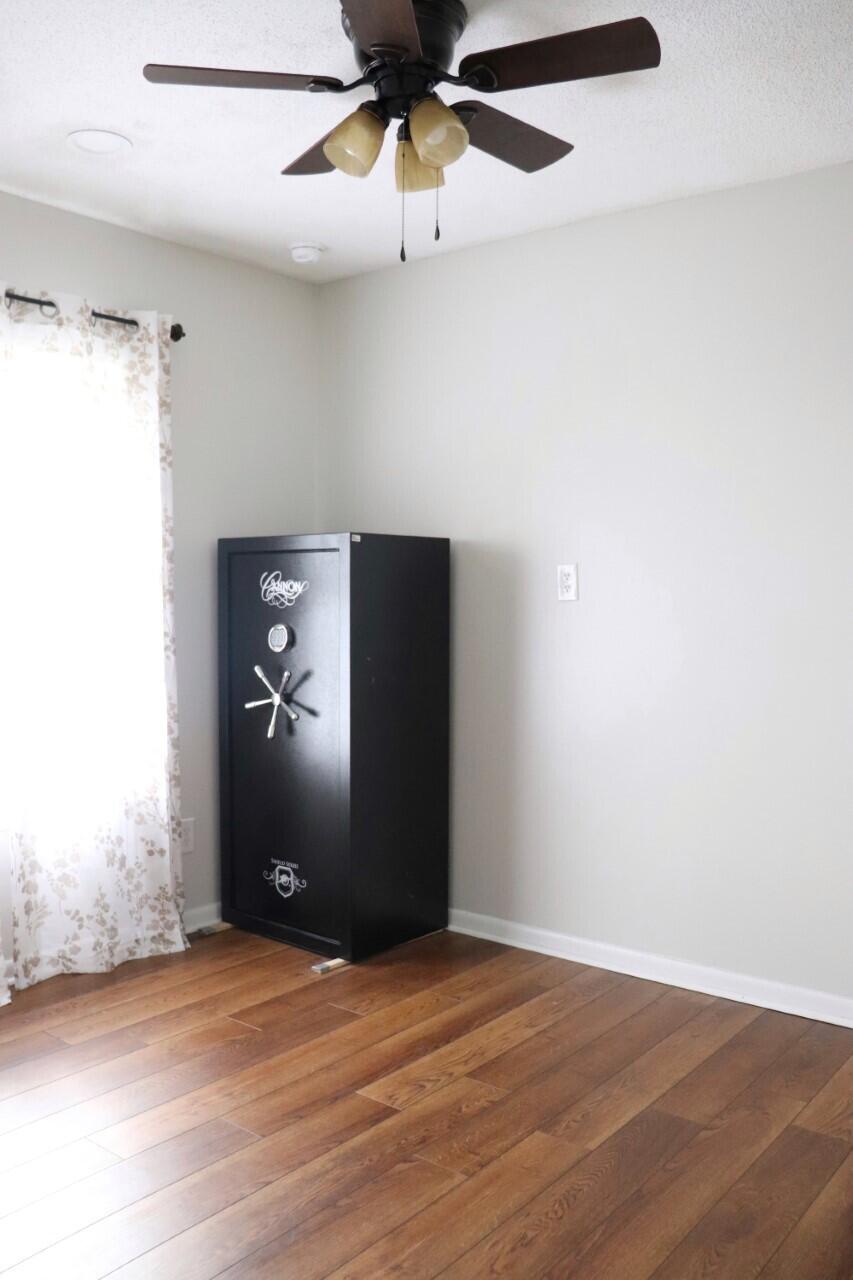 455 Ridge Lake Road Crestview, FL 32536 - Photo 11 of 22 an empty room with closet and fan