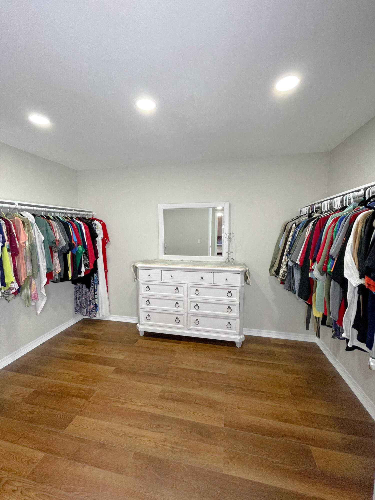 455 Ridge Lake Road Crestview, FL 32536 - Photo 22 of 22 a view of walk in closet with clothes and shoes