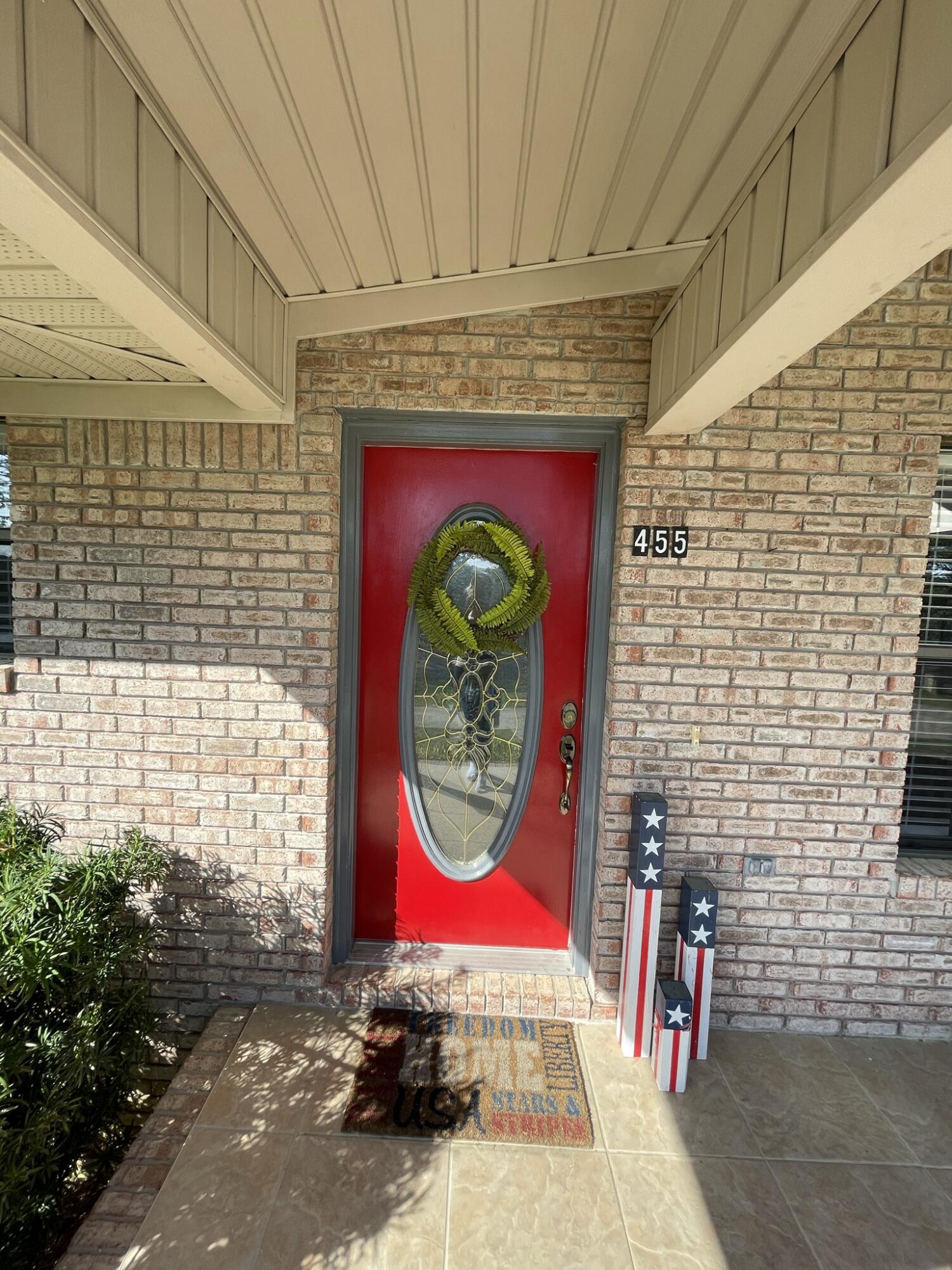 455 Ridge Lake Road Crestview, FL 32536 - Photo 3 of 22 a front view of a building with entryway