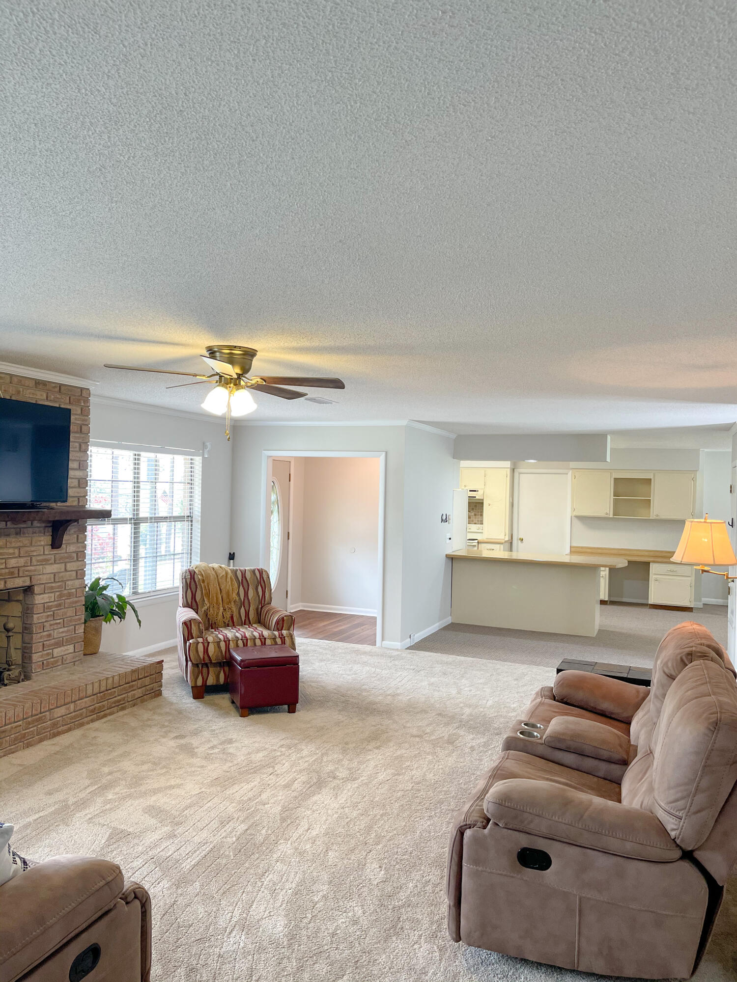 455 Ridge Lake Road Crestview, FL 32536 - Photo 6 of 22 a living room with furniture and a large window
