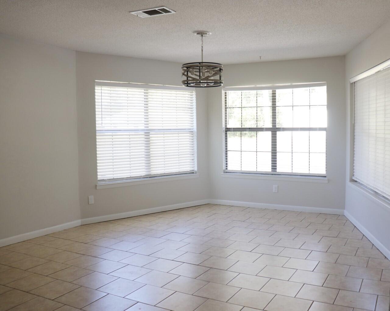 455 Ridge Lake Road Crestview, FL 32536 - Photo 10 of 22 a view of an empty room with a window