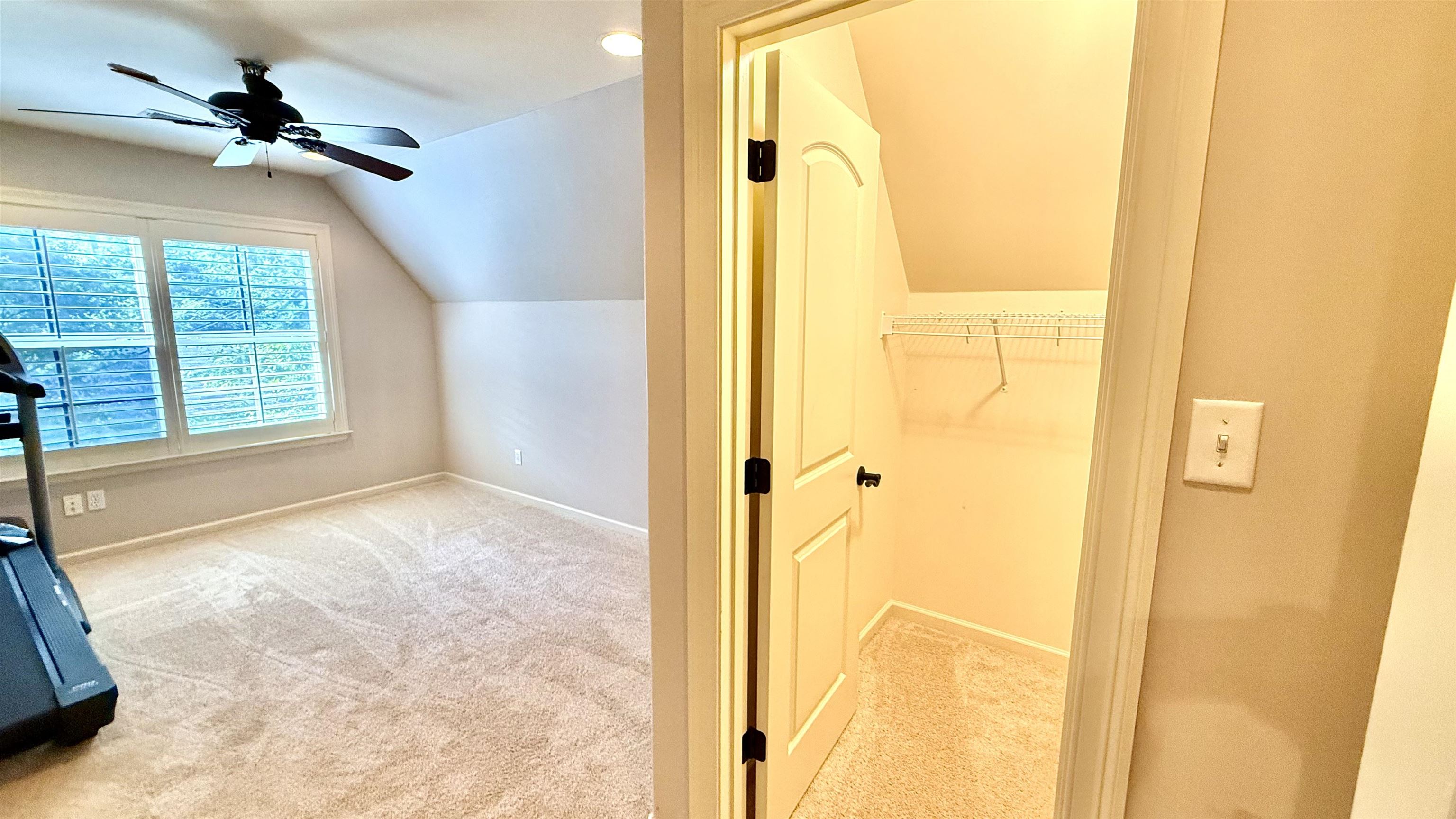 247 South Greer Street Memphis, TN 38111 - Photo 22 of 29 Additional living space with light colored carpet, vaulted ceiling, and a ceiling fan