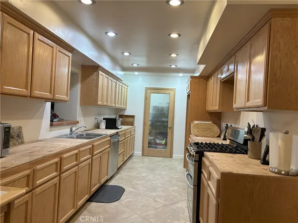 a large kitchen with a large window