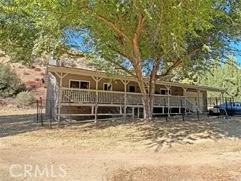 a house with trees in front of it
